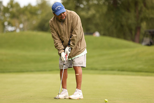 This image has an empty alt attribute; its file name is Heron-Marquez-watches-his-putt-at-the-par-4-ninth-hole-during-the-MGA-Amateur-Mens-Team-Net-Championships-at-The-Preserve-GC-on-September-8-2021.jpg